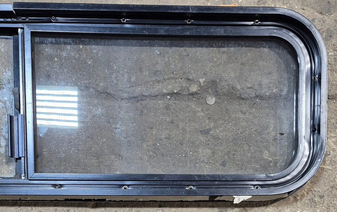 Used Black Radius Opening Window : 42 1/4" W x 11 3/4" H x 1 7/8" - Young Farts RV Parts