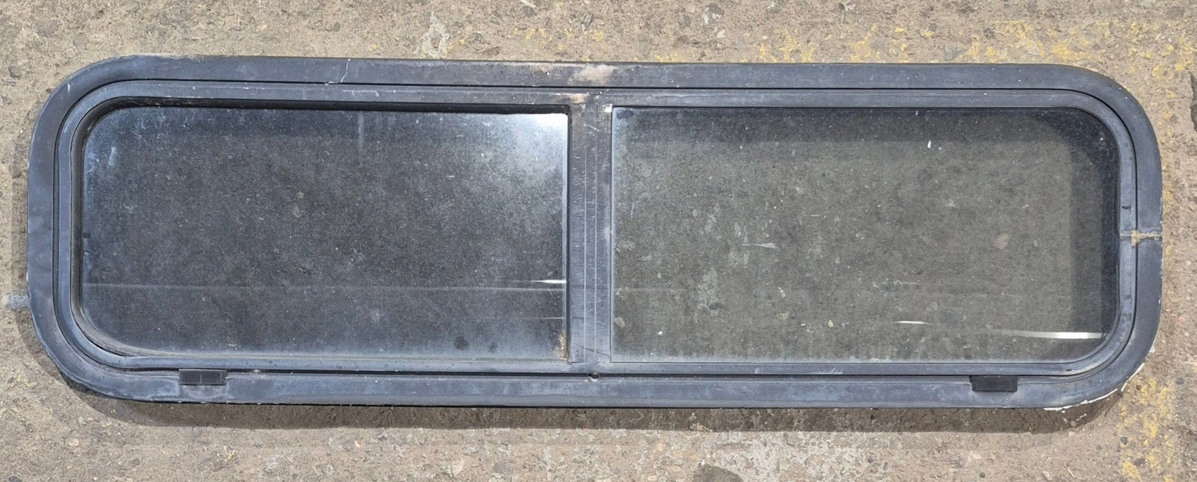 Used Black Radius Opening Window : 42 1/4" W x 11 3/4" H x 1 7/8" - Young Farts RV Parts