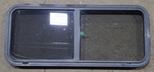 Used Black Radius Opening Window : 42 1/4" W x 17 3/4" H x 1 3/4" D - Young Farts RV Parts