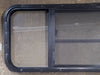 Used Black Radius Opening Window : 47 1/2" W x 17 1/2" H x 1 5/8" D - Young Farts RV Parts