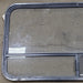 Used Black Radius Opening Window : 47 1/2" W x 22 1/4" H x 1 1/4" D - Young Farts RV Parts