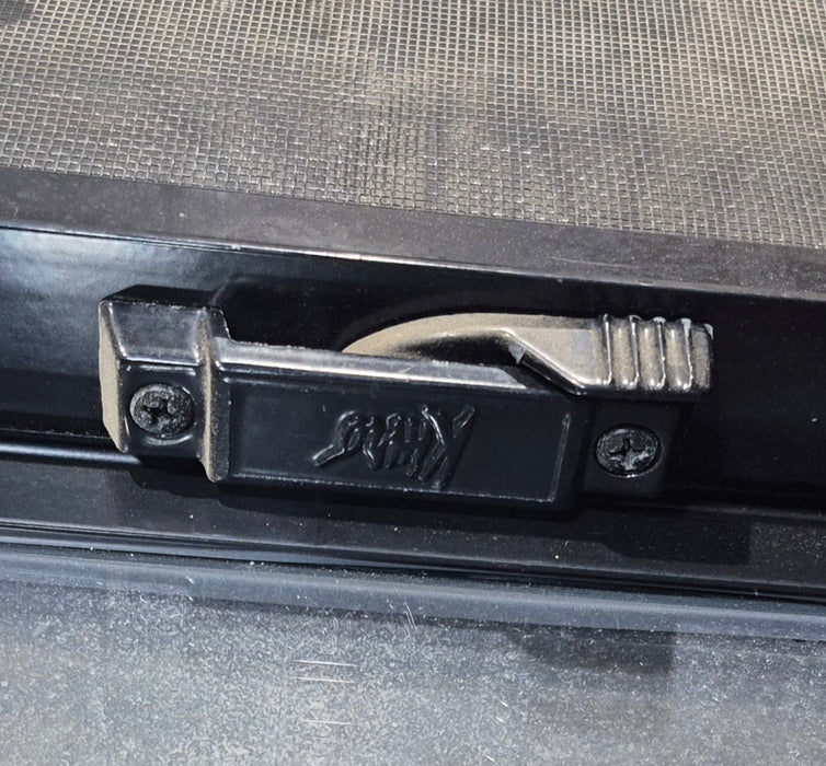 Used Black Radius Opening Window : 47 1/4" W x 34 1/4" H x 1 3/4" D - Young Farts RV Parts