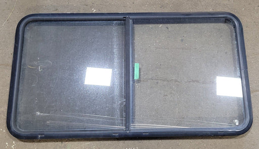 Used Black Radius Opening Window : 48 1/2" W X 25 3/4" H X 2" D - Young Farts RV Parts