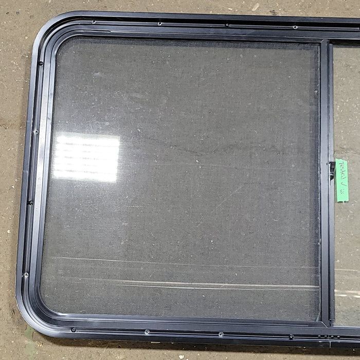 Used Black Radius Opening Window : 48 1/2" W X 25 3/4" H X 2" D - Young Farts RV Parts