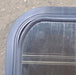 Used Black Radius Opening Window : 48 1/2" W x 261/4" H x 1 3/4" D - Young Farts RV Parts