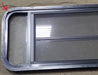 Used Black Radius Opening Window : 48 3/4" W x 16 1/2" H x 1 5/8" D - Young Farts RV Parts