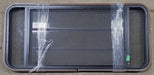 Used Black Radius Opening Window : 49" W x 23" H x 1 1/4" D - Young Farts RV Parts