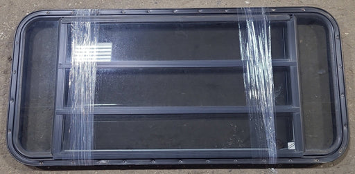 Used Black Radius Opening Window : 49" W x 23" H x 1 1/4" D - Young Farts RV Parts