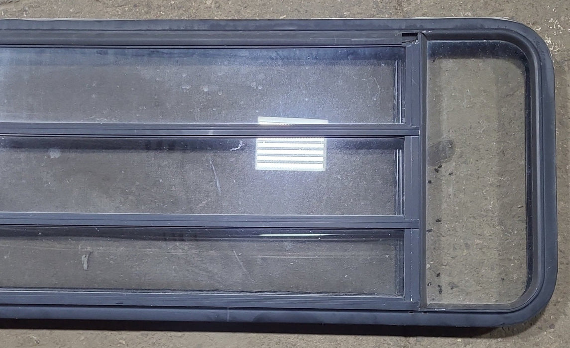Used Black Radius Opening Window : 59 3/8" W x 21 3/8" H x 1 3/4" D - Young Farts RV Parts