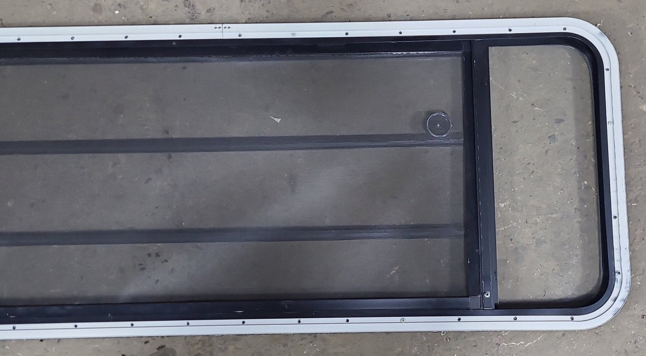 Used Black Radius Opening Window : 59 3/8" W x 21 3/8" H x 1 3/4" D - Young Farts RV Parts