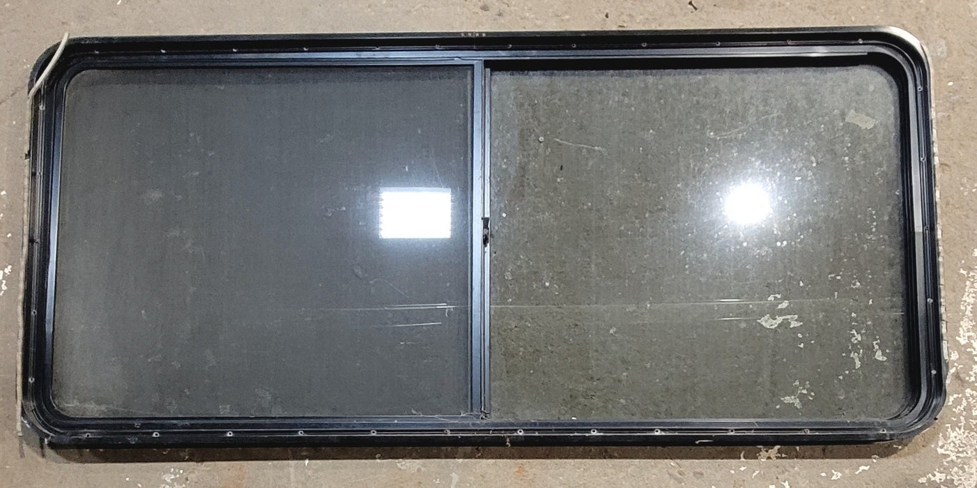 Used Black Radius Opening Window : 64 1/4" W x 28 3/4" H x 1 3/4" - Young Farts RV Parts