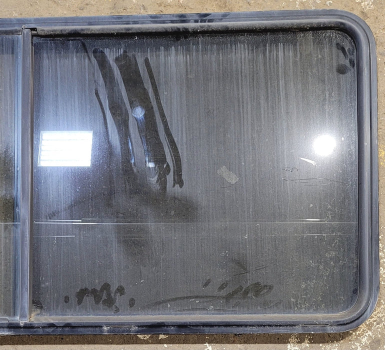 Used Black Radius Opening Window : 64 1/4" W x 28 3/4" H x 1 3/4" - Young Farts RV Parts