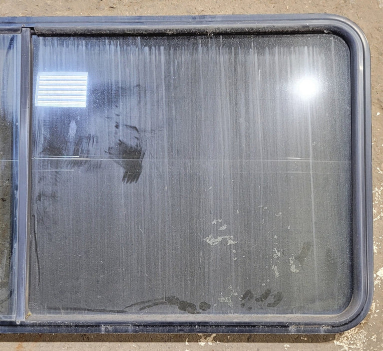 Used Black Radius Opening Window : 64 1/4" W x 28 3/4" H x 1 3/4" - Young Farts RV Parts