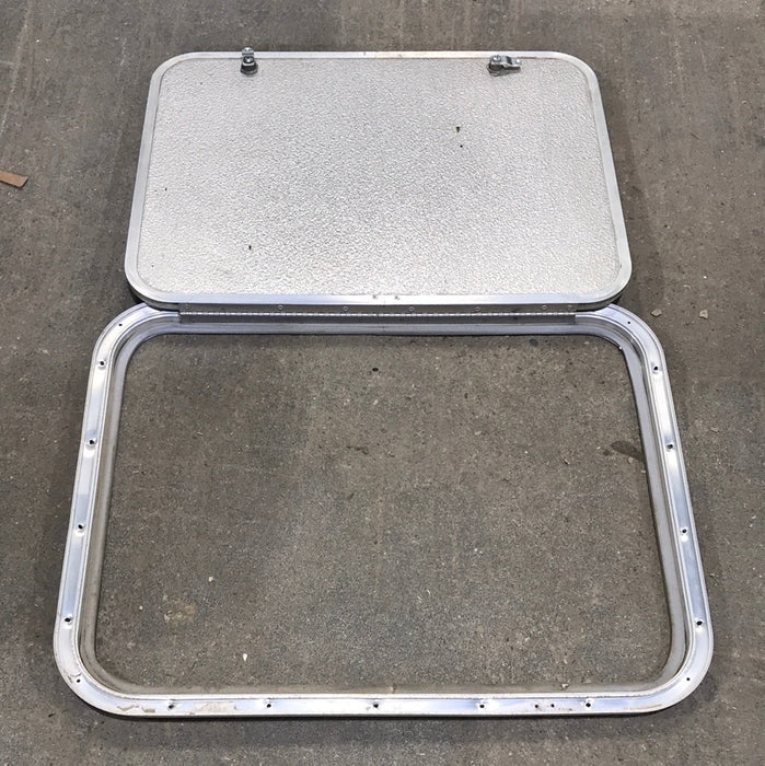Used Corner Radius Cargo Door 23 3/4" W x 17 3/4" H x 3/4"D - Young Farts RV Parts