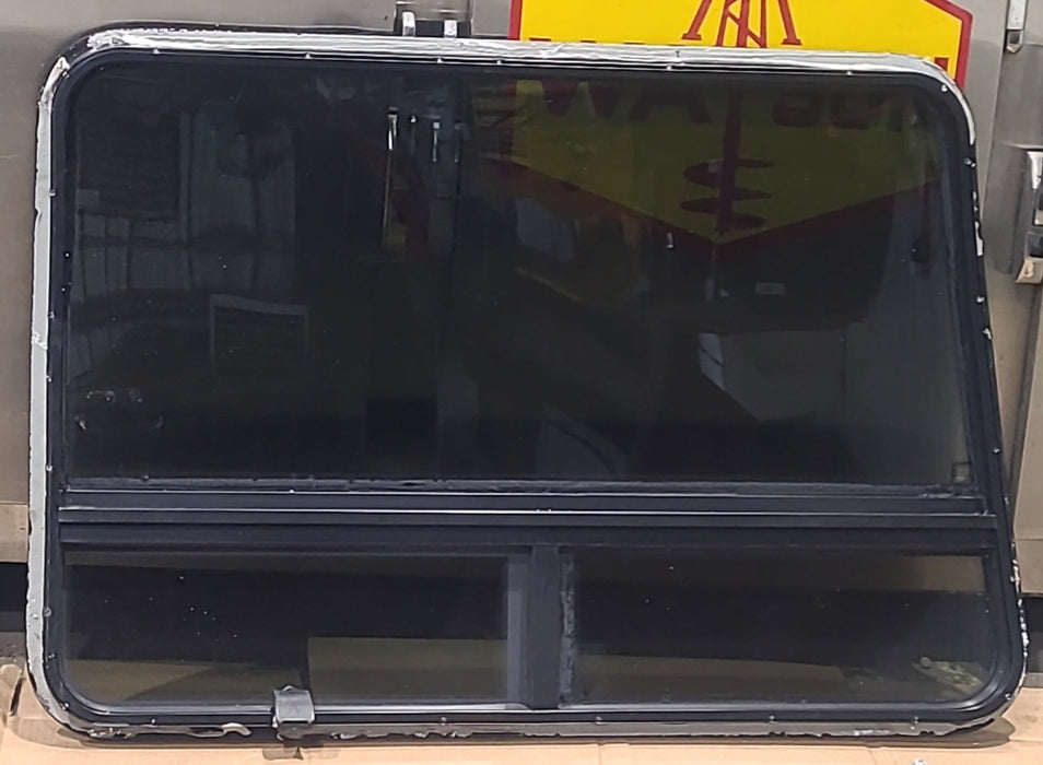 Used Curved Frameless Black Radius Opening Window : 41" X 27 1/4" X 1 1/4" D - Young Farts RV Parts