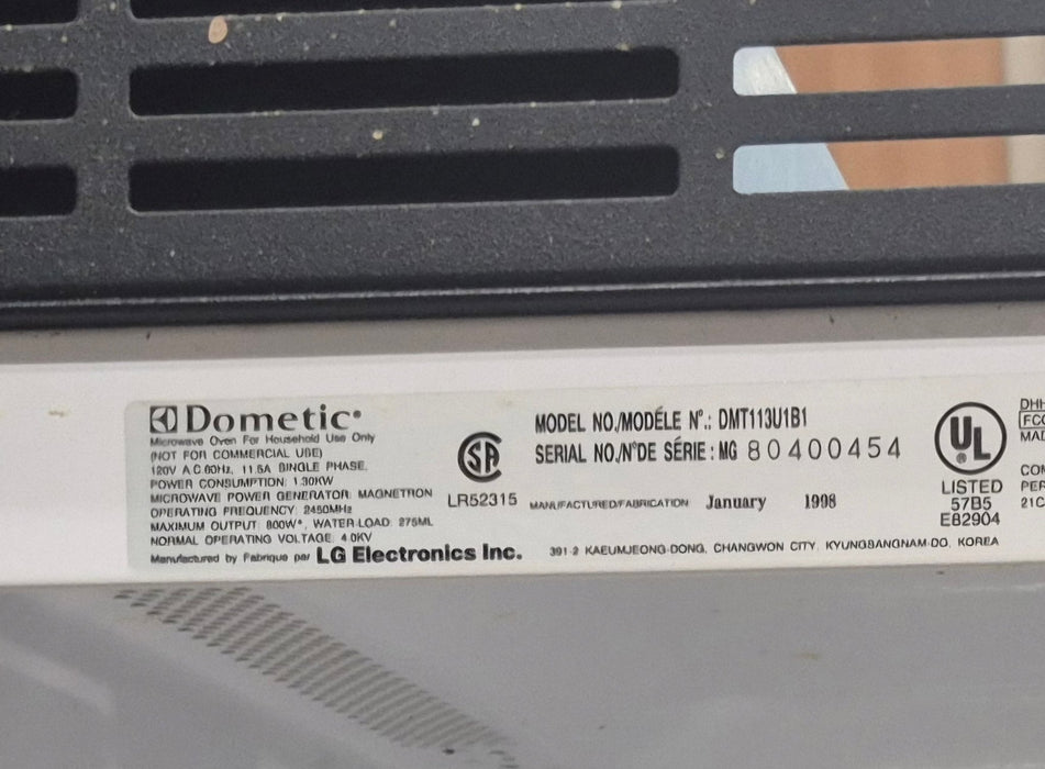 Used DOMETIC RV Microwave 20 7/8" W x 14" H x 14 1/2" D - Young Farts RV Parts