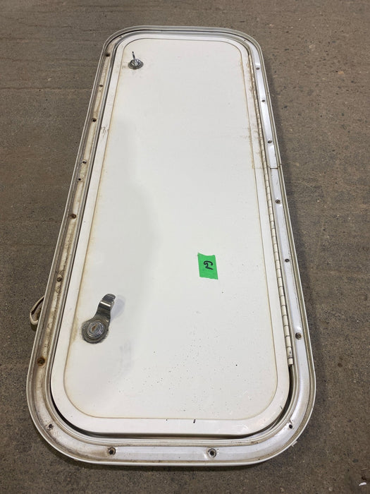 Used Radius Corner Cargo Door 29 3/4" W x 10 3/4" H x 3/4" D