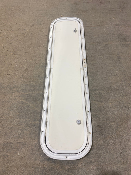 Used Radius Corner Cargo Door 35 1/2" W x 7 3/4" H x 3/4" D - Young Farts RV Parts