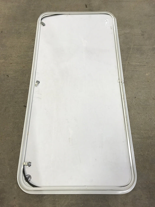 Used Radius Cornered Cargo Door 55" x 25 1/2" x 1" D - Young Farts RV Parts