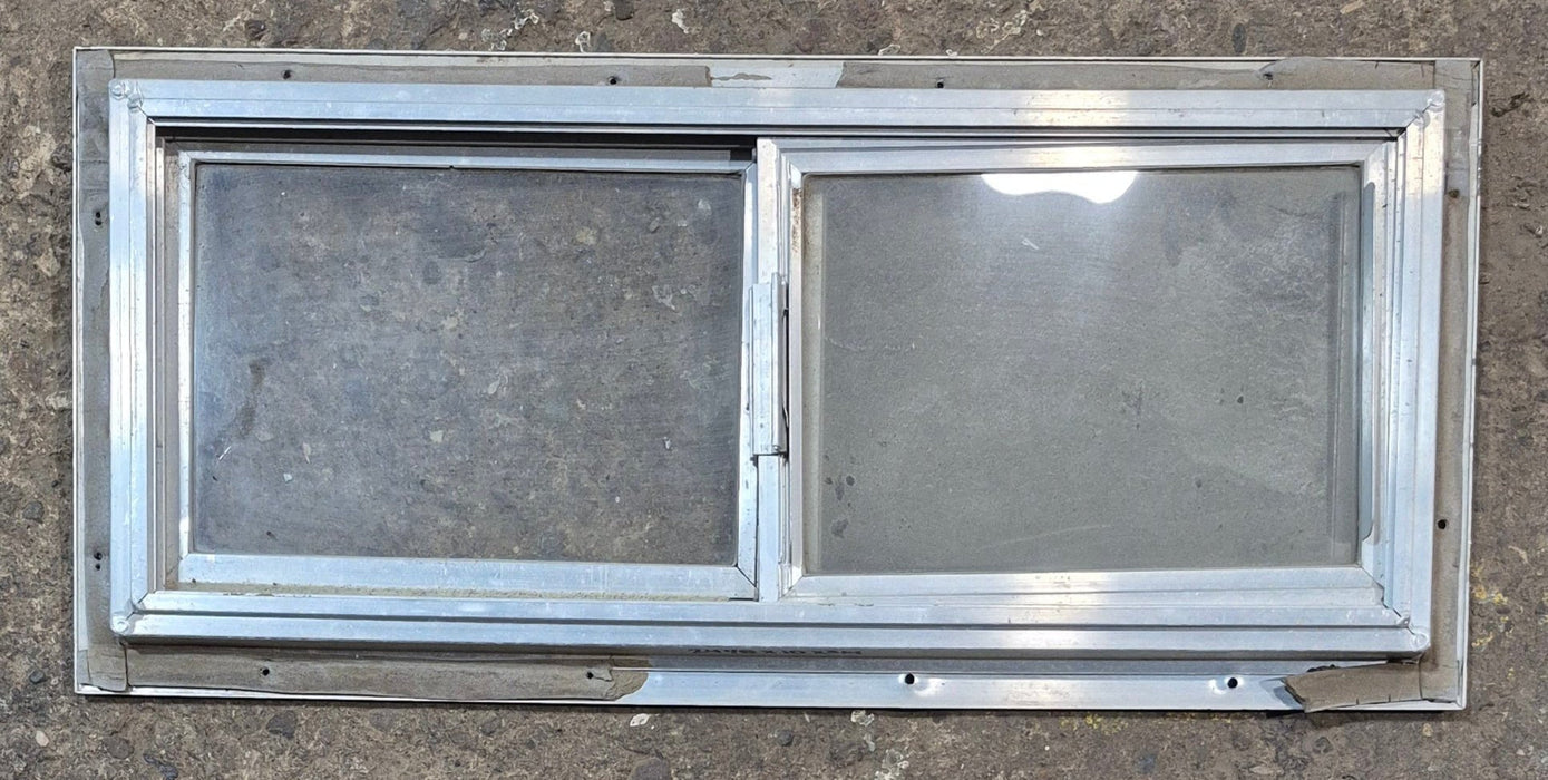 Used Silver Square Opening Window: 24 1/8" W x 10" H x 3/4" D - Young Farts RV Parts