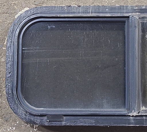 Used Slanted Black Radius Opening Window : 30 1/4" W X 11 3/4" H X 1 7/8" D - Young Farts RV Parts