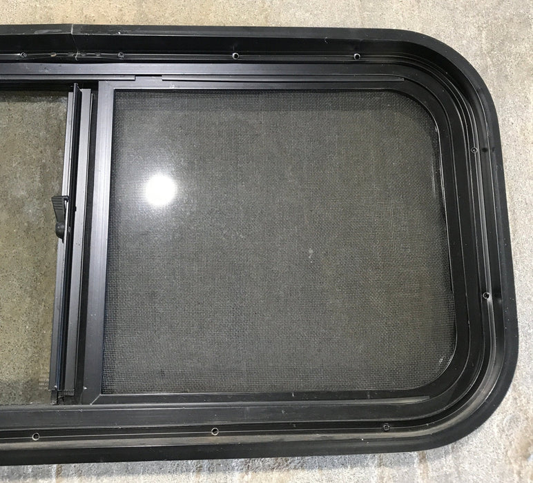 Used Slanted Black Radius Opening Window : 36 3/4" W x 13 1/2" H x 2" D - Young Farts RV Parts