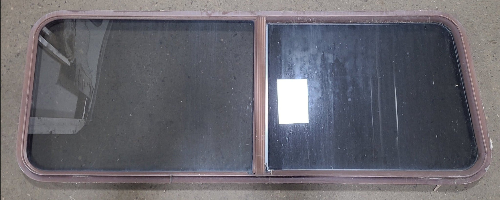 Used Slanted Brown Radius Opening Window : 22 1/8" H X 58 3/4" W X 2" D - Young Farts RV Parts