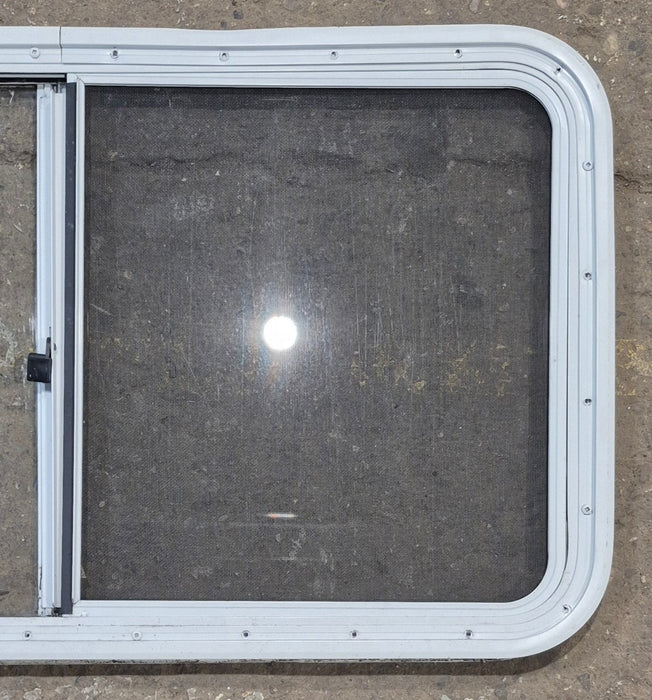 Used Slanted White Radius Opening Window : 46 3/4" W x 21 1/4" H x 1 1/4" D - Young Farts RV Parts
