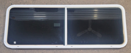 Used White Radius Emergency Opening Window : 59 1/2" W x 21 1/2" H x 2" D - Young Farts RV Parts