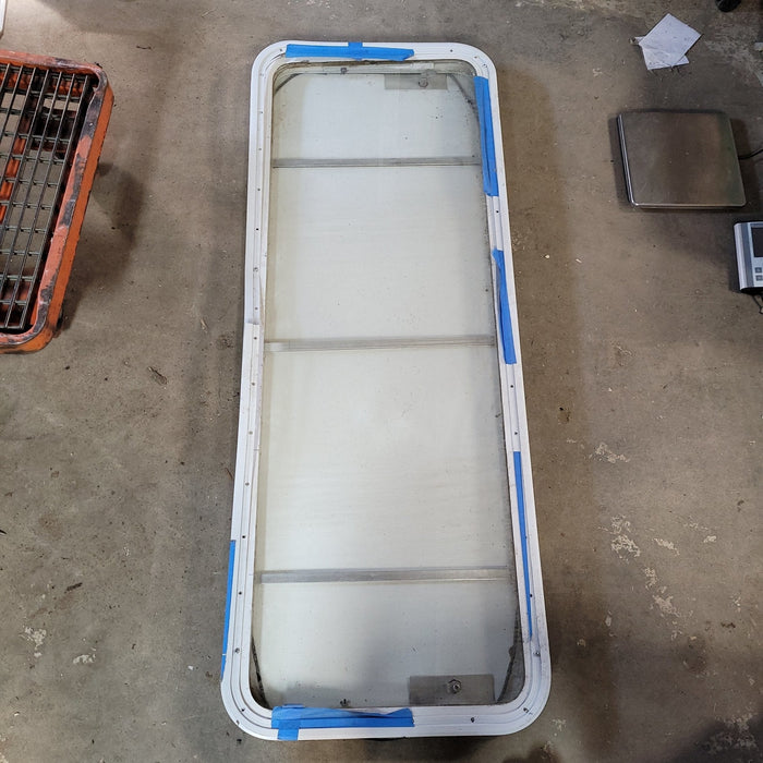 Used White Radius Non-Opening Window With Rock Guard Cover : 59 1/2 X 21 X 2" D - Young Farts RV Parts