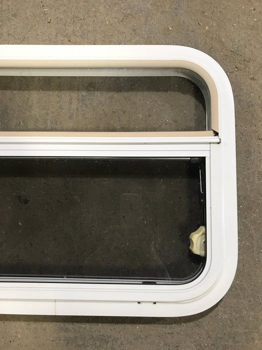 Used White Radius Opening Window : 23 1/2" W x 17 1/2" H x 1 1/2" D - Young Farts RV Parts