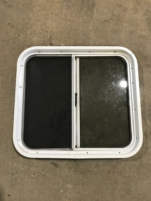 Used White Radius Opening Window : 24 1/4" W x 21 1/2" H x 2" D - Young Farts RV Parts