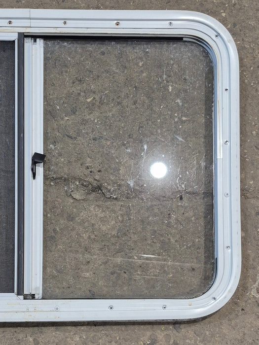 Used White Radius Opening Window : 29 1/4" W x 21 1/2" H x 1 1/4" D - Young Farts RV Parts